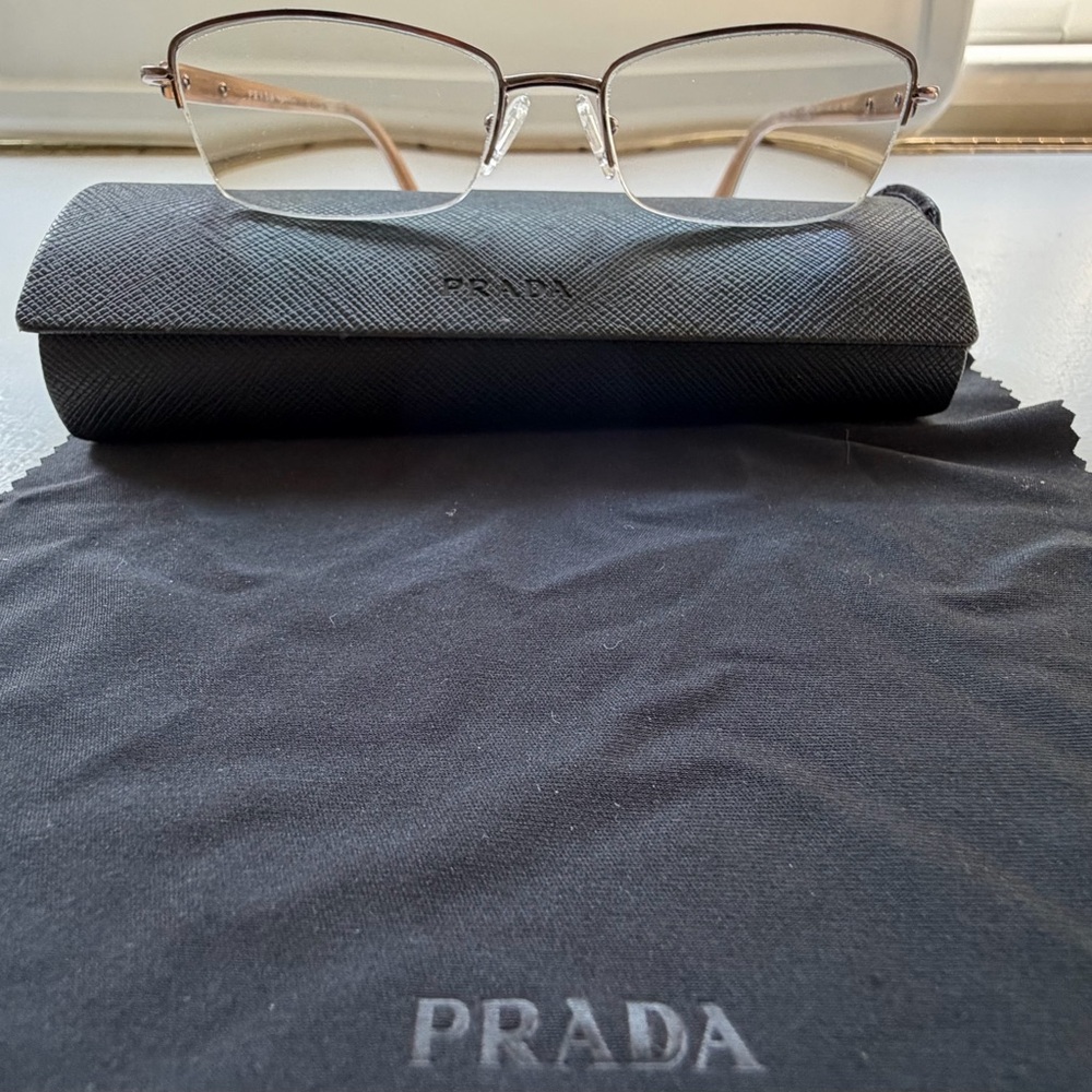 Prada Rimless Rectangle Glasses with Gold-Tone Temples and Black Case